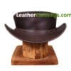 Tan brown leather short top hat with low crown and curved Western-style brim