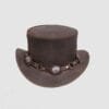 Distressed brown leather top hat with concho harness band and metal ring accents