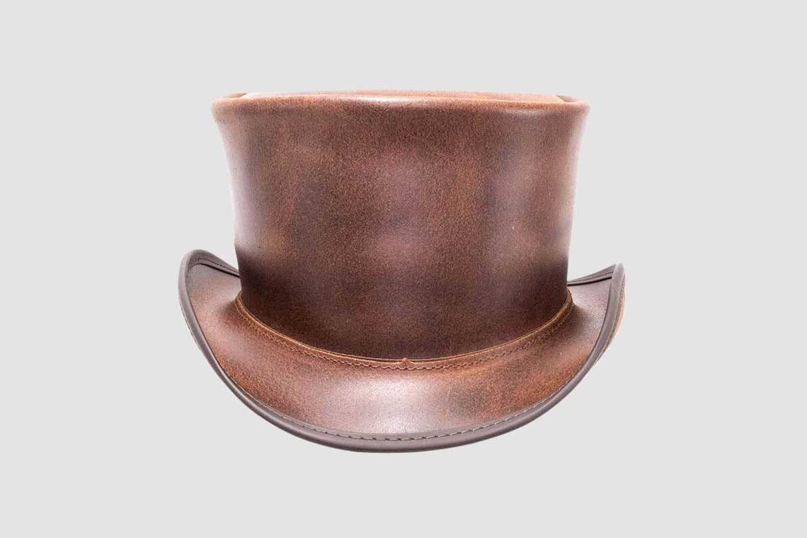 Brown leather top hat with unbanded design and classic frontier styling