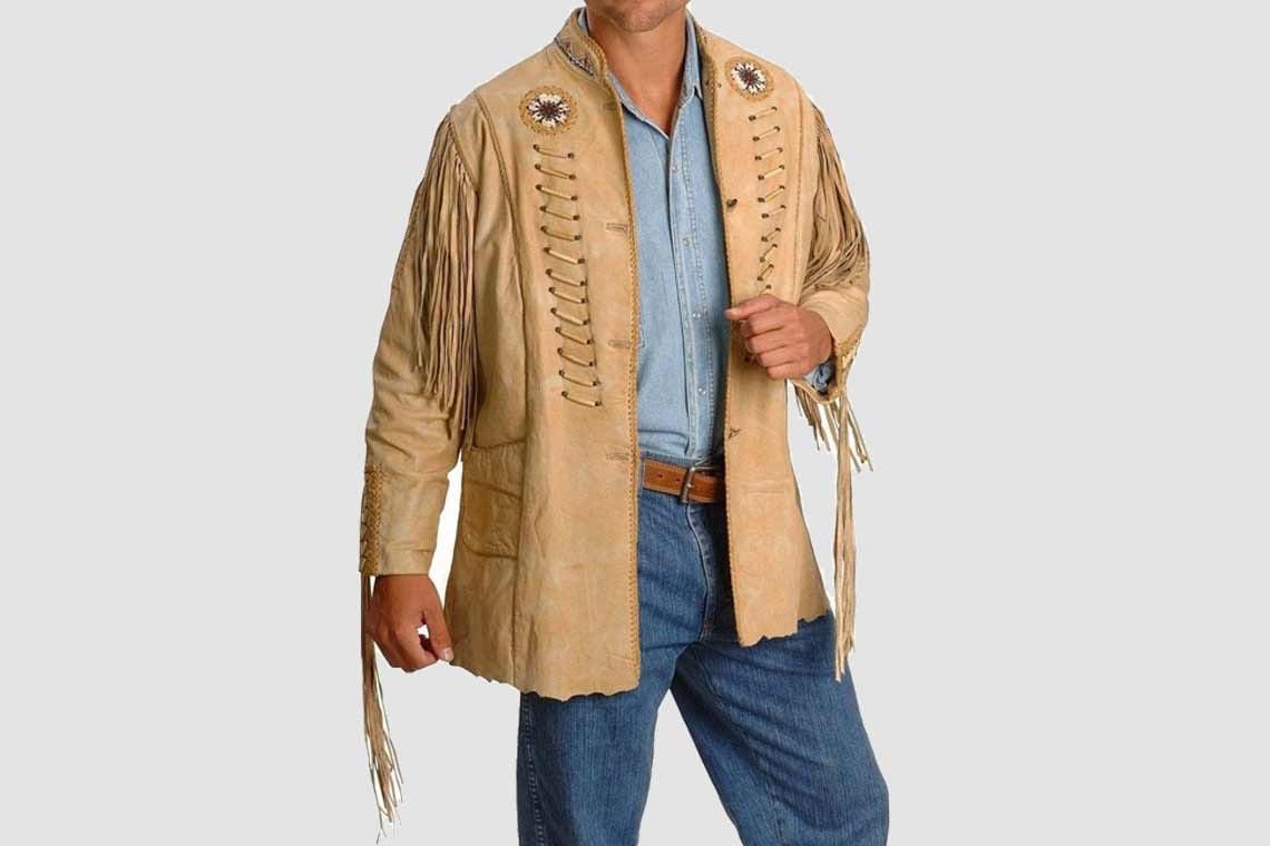 Men’s beige fringe leather long jacket with bone accents and beaded medallions