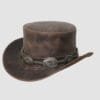 Distressed brown leather top hat with decorative concho band and vintage Western finish