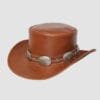 Brown leather top hat with decorative silver conchos and Western-inspired hatband