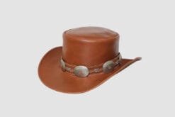 Brown leather top hat with decorative silver conchos and Western-inspired hatband