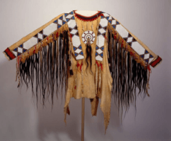 Women’s beaded suede war shirt with long dark hair trim and geometric beadwork