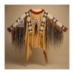Man wearing brown suede western fringe shirt with beaded detailing and long fringe accents
