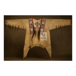 Women's minimalist suede war shirt with chest hair trim, beaded panels, and hem fringe