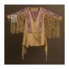 Tan suede war shirt with pink beaded panels, long sleeve fringe, and asymmetrical hem