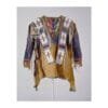 Woman wearing tan suede western fringe shirt with beaded detailing and fringe accents