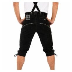 Angled view of authentic black Bavarian Bundhosen with matching suspenders